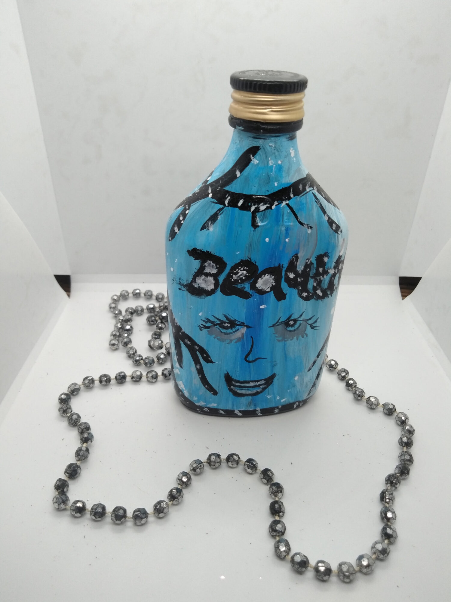 handmade blue mini bottle art